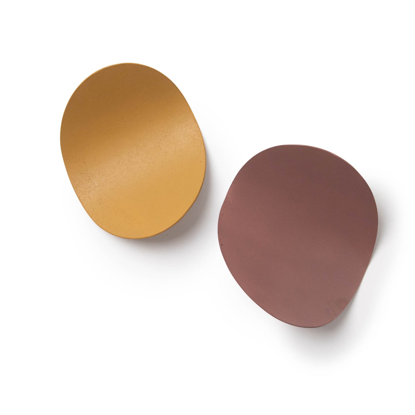 a set of two curvy wooden props for product photography and film