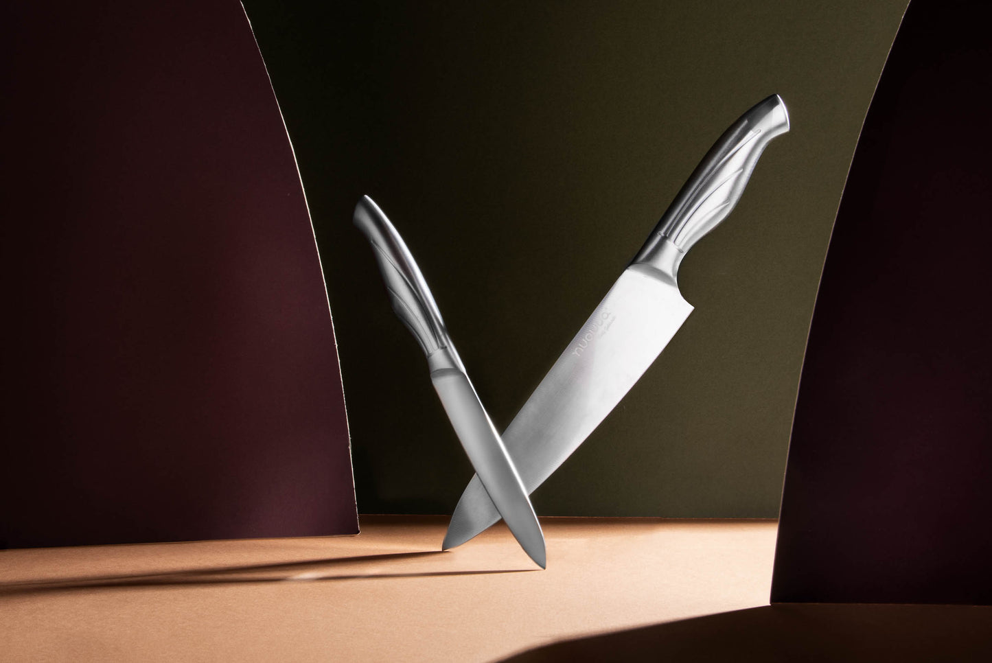 A still life photoshoot using two large curved photography props