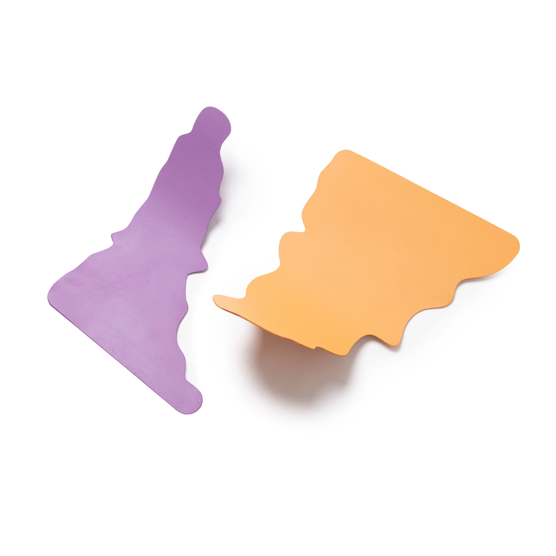 a pair of wave shaped props for photography and film