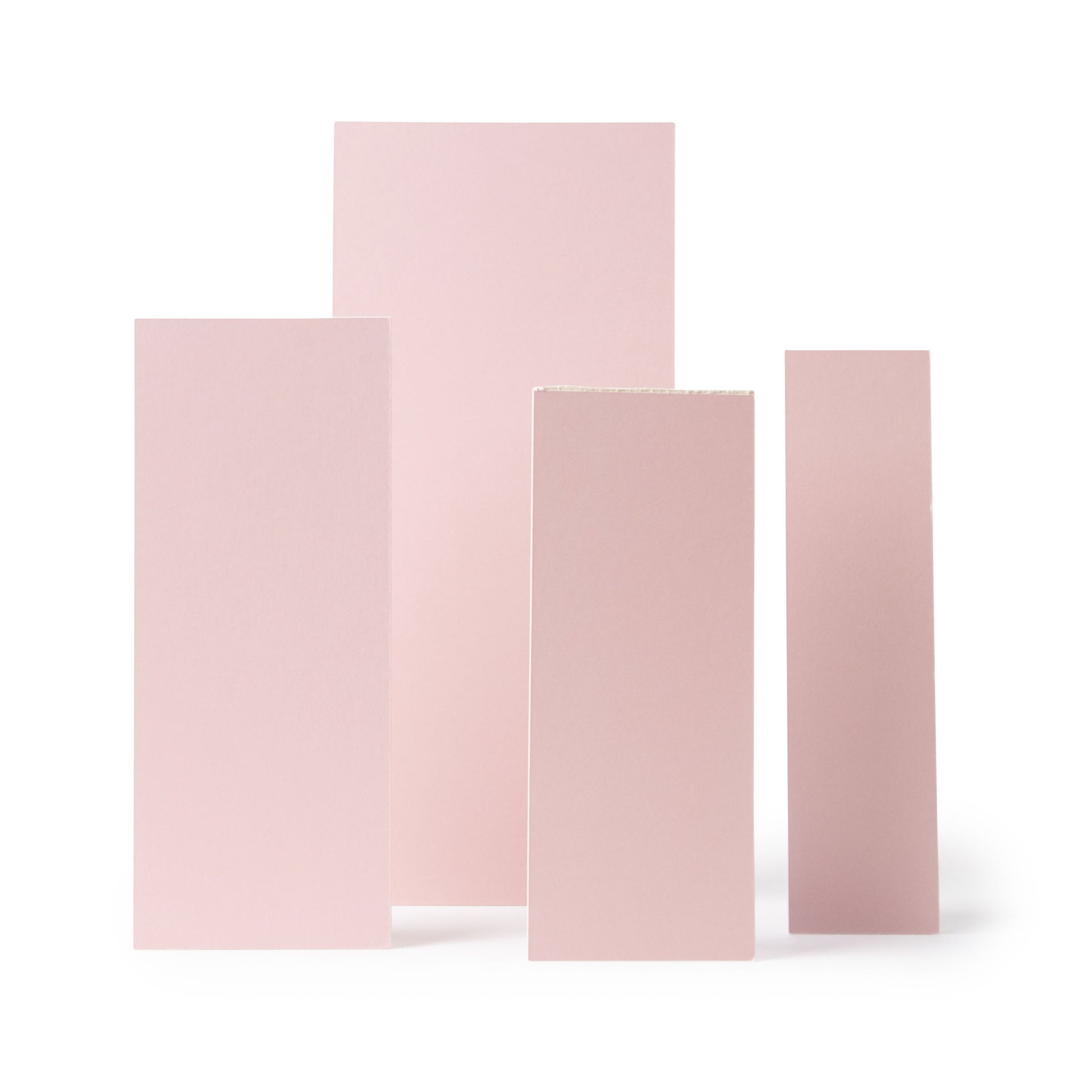 Four rectangular pink panels of varying sizes, for use in photography