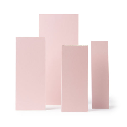 Four rectangular pink panels of varying sizes, for use in photography