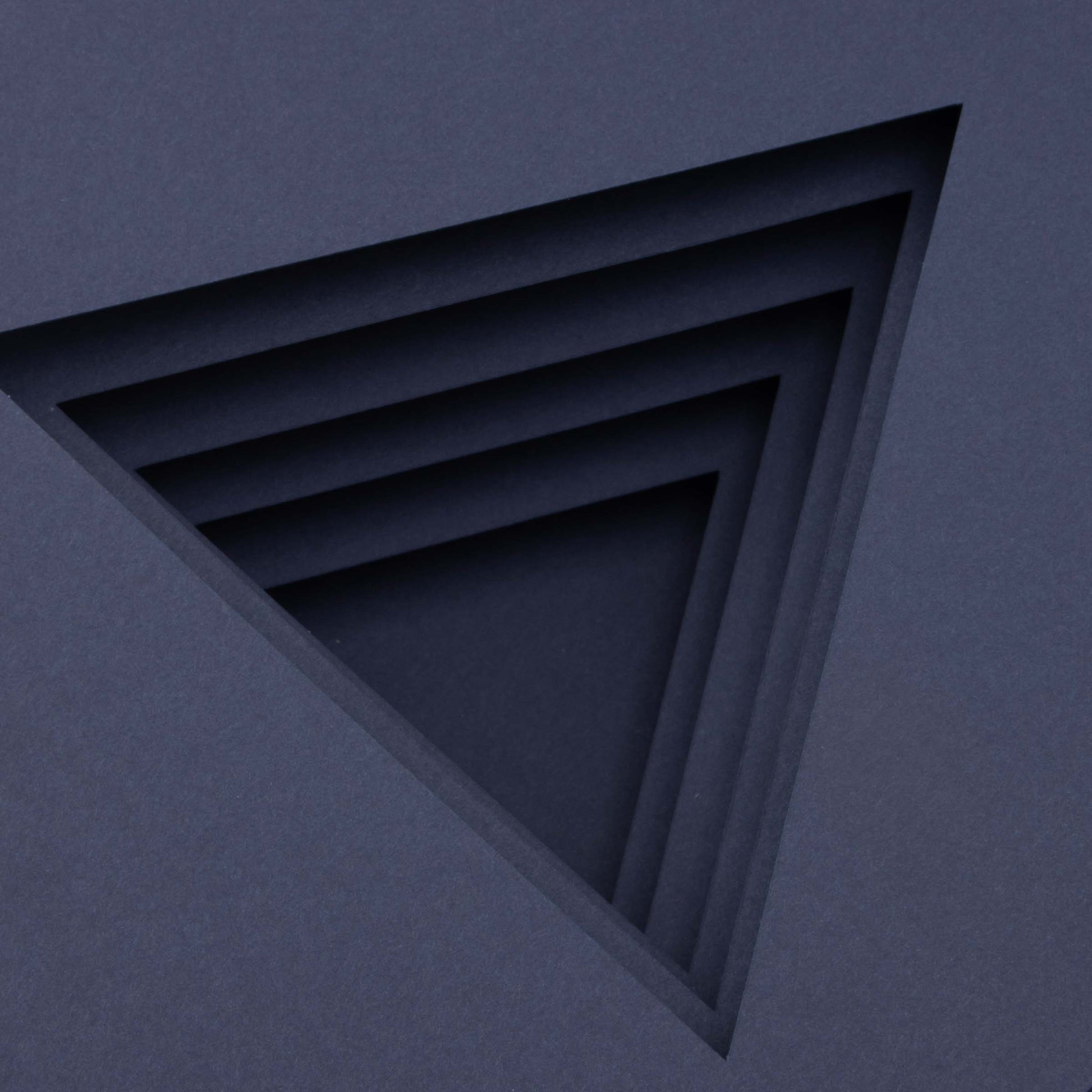 Geometric design of nested triangles on a textured purple background